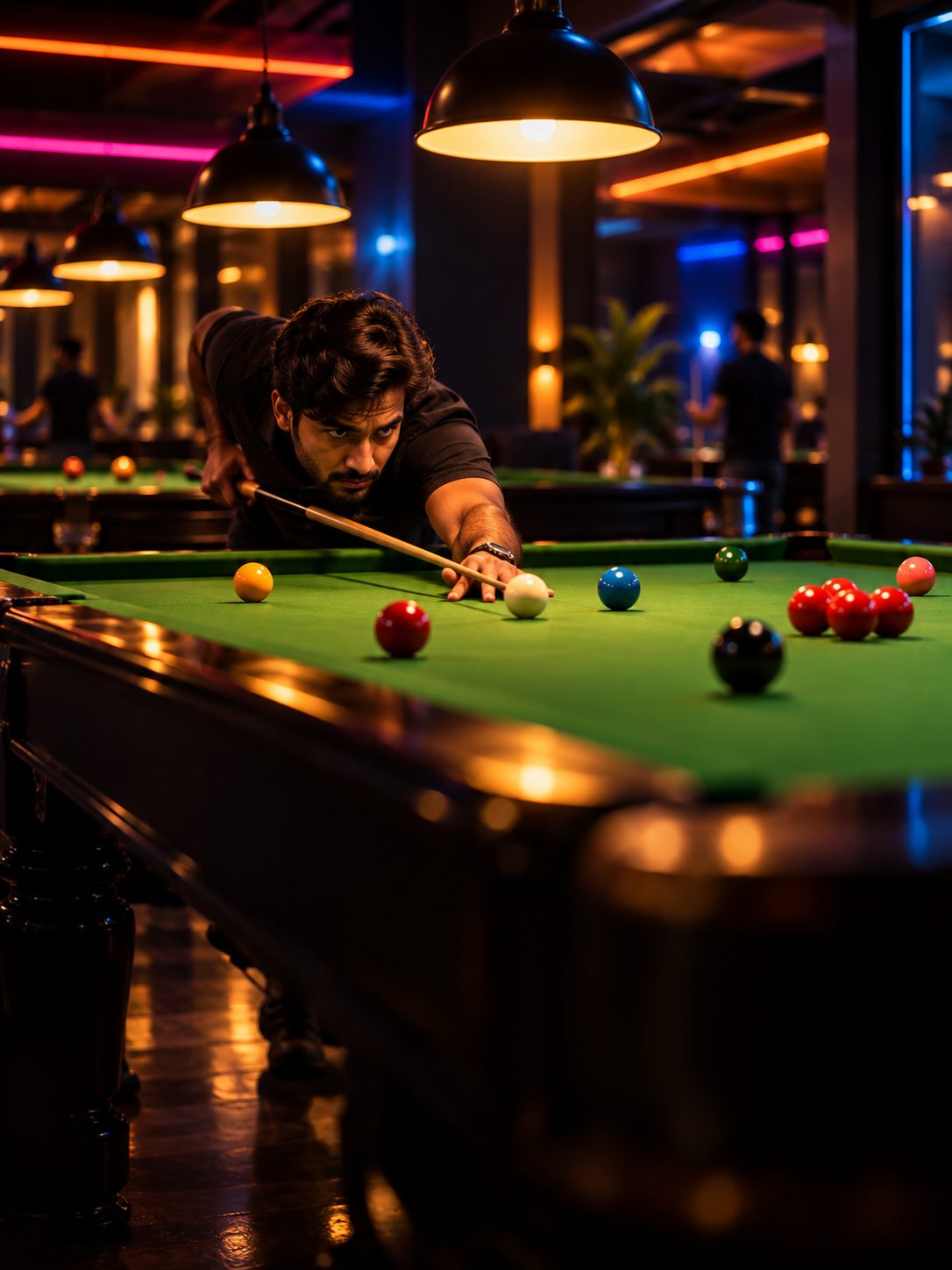 A snooker table under warm lights in a cue sports club